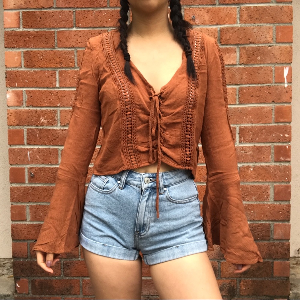 Lace up bell sleeve top